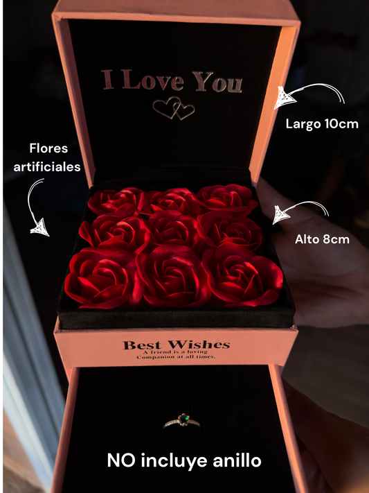 caja rosada con rosas rojas