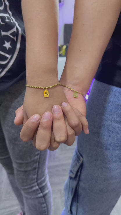 Pulseras tejido lazo con dije mini